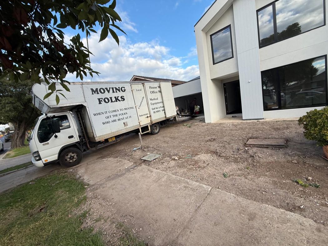 The branded Moving Folks removal truck loaded and ready for a job